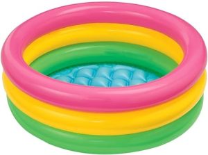 one of my favorite toddler beach essentials is a mini swimming pool