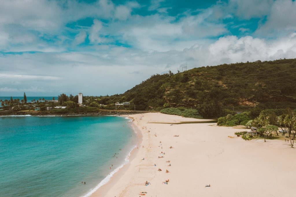 view of waimea bay beach, one of the best us beaches in july to visit