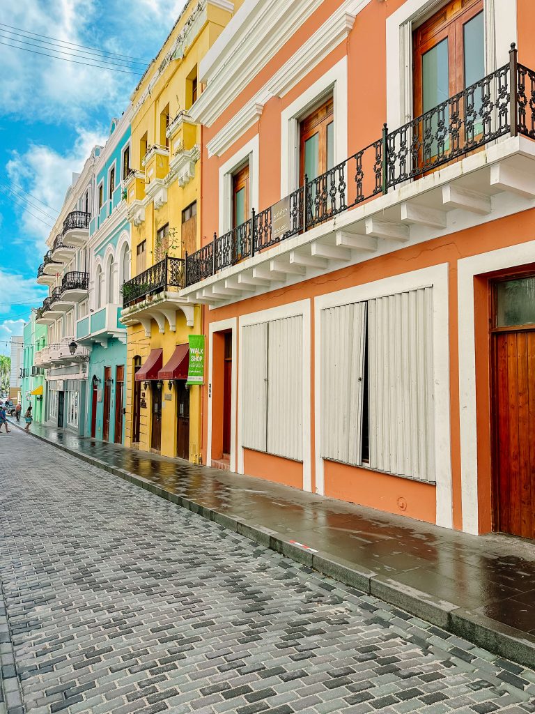 a puerto rico itinerary should include walking along the colorful buildings of old san juan
